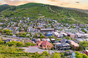 Aerial view at dusk of a mountain view and a residential view