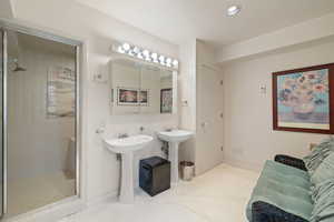 Full bath with a stall shower and recessed lighting