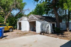 Detached garage with concrete driveway