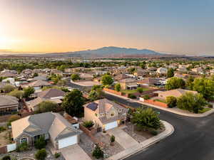 Aerial view at dusk of a residential view and a mountain view