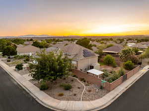 Aerial view at dusk of a residential view and a mountain view