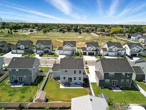 Aerial view of residential area and back of home