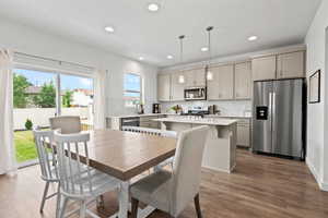 Dining space with recessed lighting and room for a large dining table