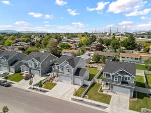 Aerial perspective of residential area with mountains