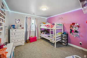 Bedroom featuring carpet flooring