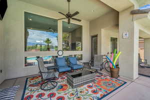 View of patio / terrace with outdoor lounge area and a ceiling fan
