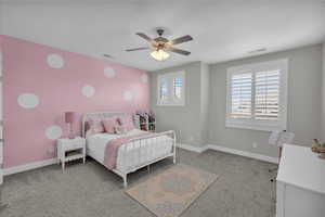 Bedroom with carpet and ceiling fan