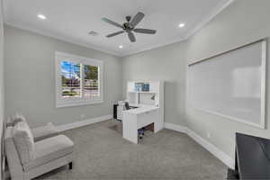 Office area featuring light carpet, ornamental molding, recessed lighting, and ceiling fan