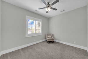 Unfurnished room featuring baseboards and carpet floors