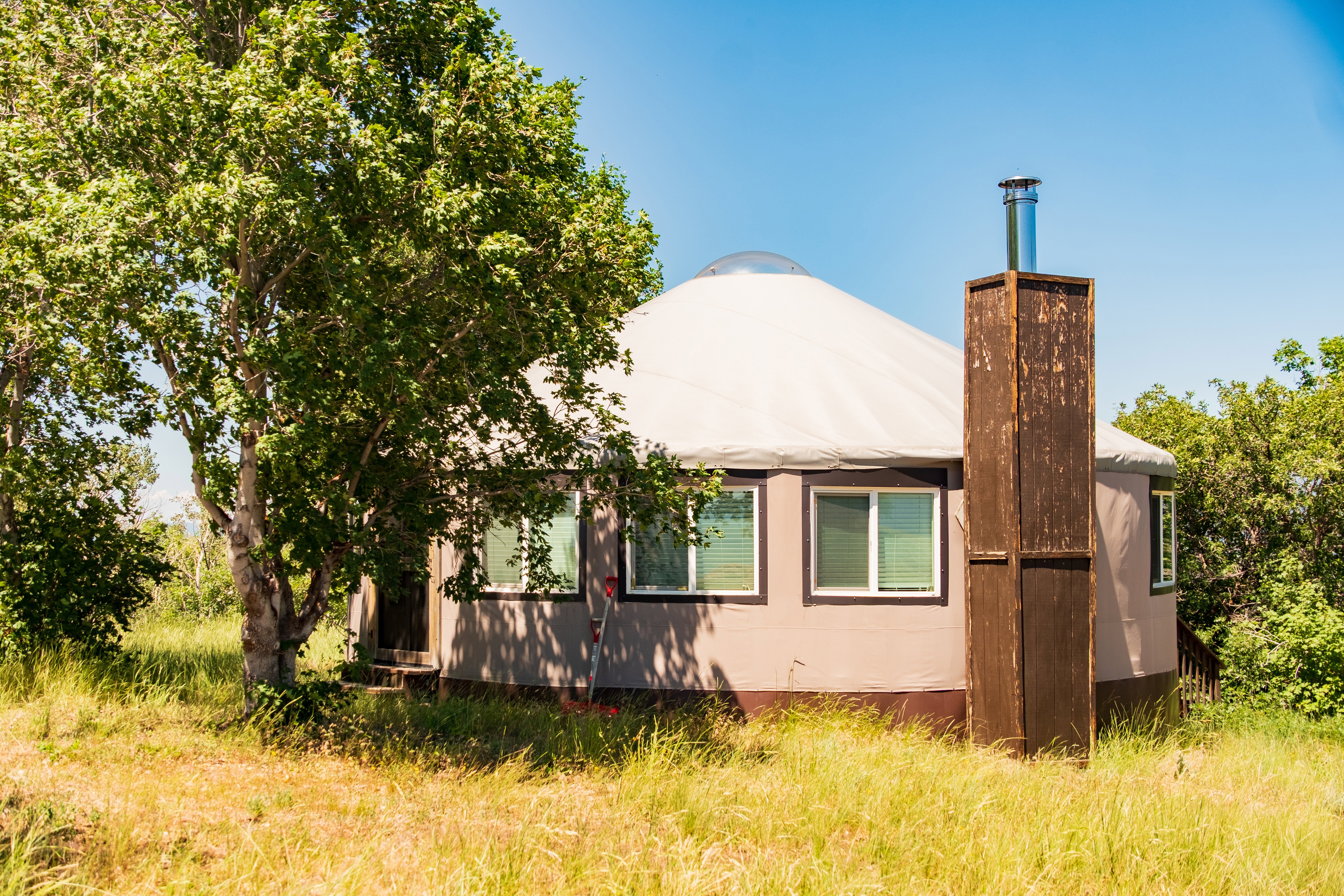 View of property exterior with a chimney