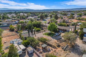Aerial view of residential area featuring mountains