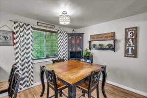 Dining room featuring wood finished floors