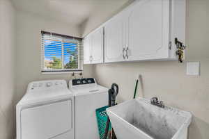 Washroom with independent washer and dryer and cabinet space