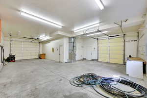 Garage with heating unit and a garage door opener