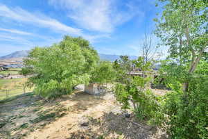 View of yard featuring a mountain view
