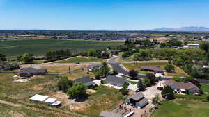 Aerial view of sparsely populated area featuring a mountainous background