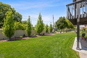 View of fenced backyard
