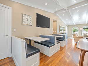 Dining area featuring light wood-style flooring, recessed lighting, and wooden ceiling