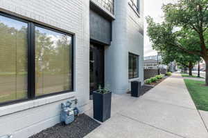 Entrance to property featuring a patio