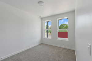 Empty room with light carpet