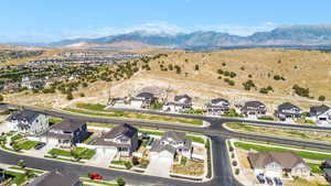 Aerial view of residential area with a mountain backdrop