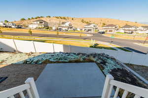 View of yard featuring a residential view, a patio, and a mountain view