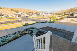 View of yard with a residential view and a mountain view