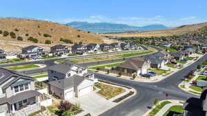 Aerial view of residential area with a mountainous background