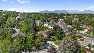 Aerial view of residential area with a mountainous background