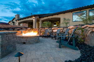 View of patio / terrace with a fire pit