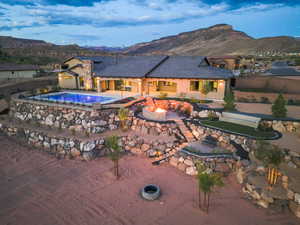 View of subject property featuring mountains