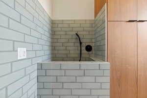 Bathroom with tile walls