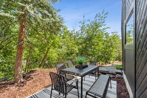 View of patio with outdoor dining space