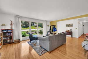 Living area featuring light wood-style flooring
