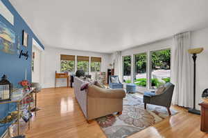 Living area featuring light wood-style floors