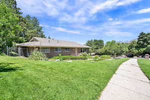View of front of house with brick siding