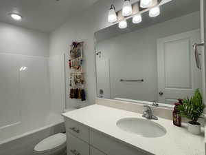 Full bathroom with vanity and bathing tub / shower combination