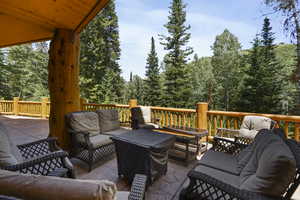 Wooden terrace with an outdoor living space