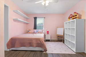 Bedroom #3 with LVP flooring and ceiling fan