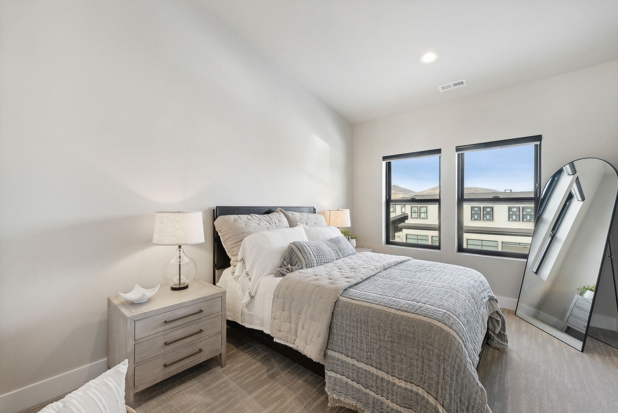 Bedroom with recessed lighting and wood finished floors