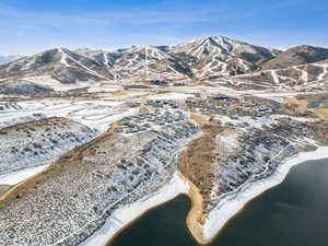 View of mountain backdrop with a large body of water