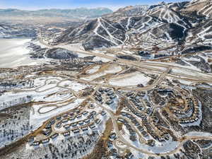 Snowy aerial view with a mountain view