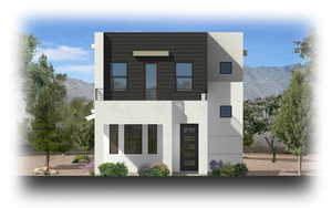 View of front of home, featuring stucco siding, and a balcony