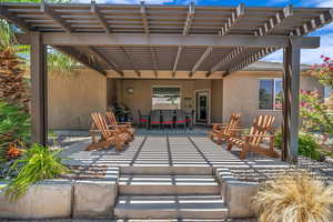 View of patio / terrace with a pergola and outdoor dining area