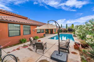 Outdoor pool featuring a patio
