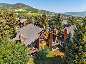 View of subject property with a mountain backdrop