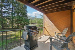 View of patio / terrace featuring grilling area and a mountain view