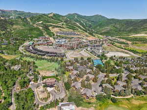 Aerial overview of property's location with mountains
