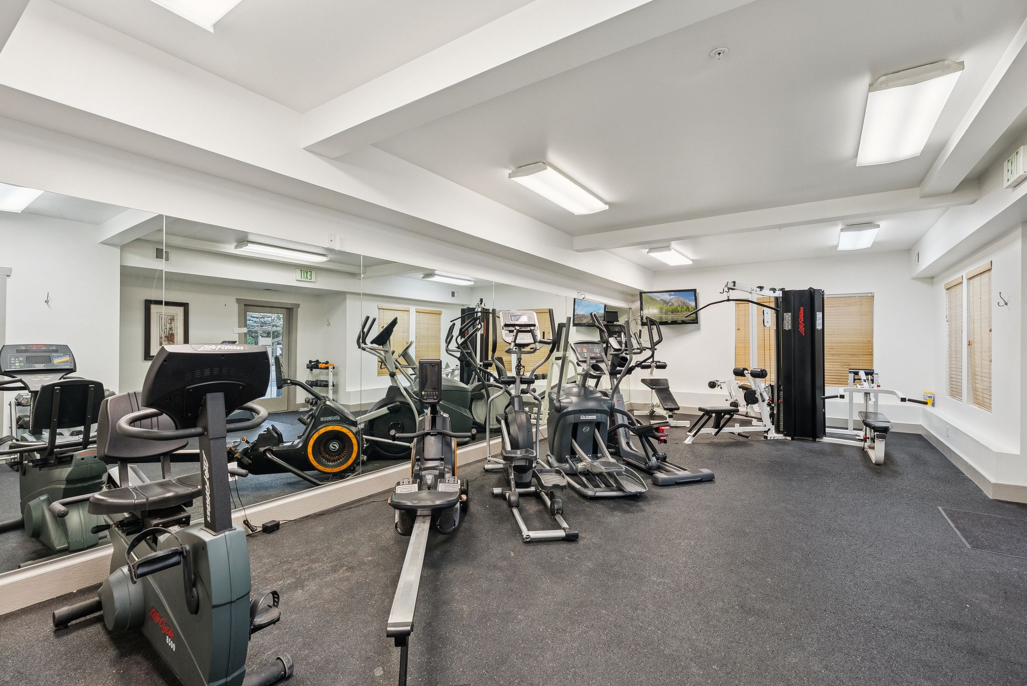 Gym featuring baseboards