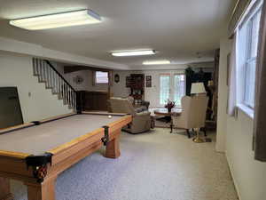 Recreation room featuring billiards table and carpet floors